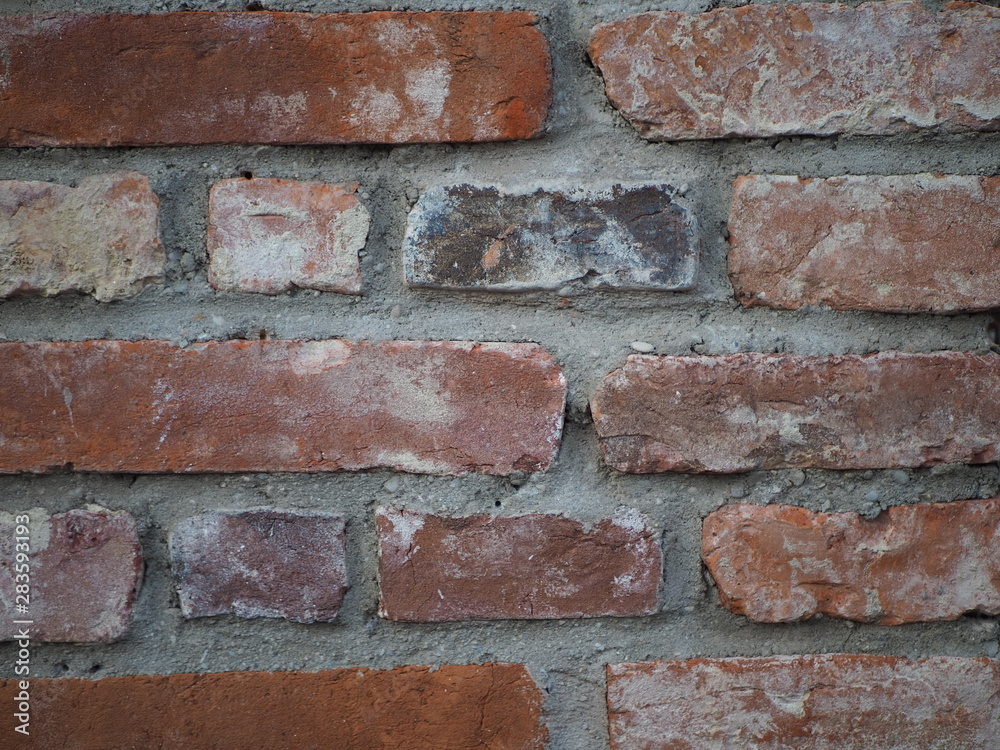 Old red brick wall background Old red brick wall background
