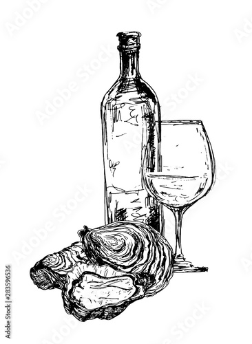 Bottle of wine, oysters and glass