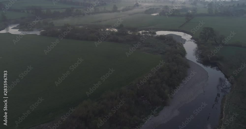 Flight over a foggy river in north Yorkshire early in the morning. Flight over a foggy river in north Yorkshire early in the morning.