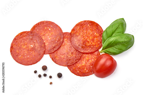 Chorizo sausage slices, Traditional spanish sausage, isolated on white background