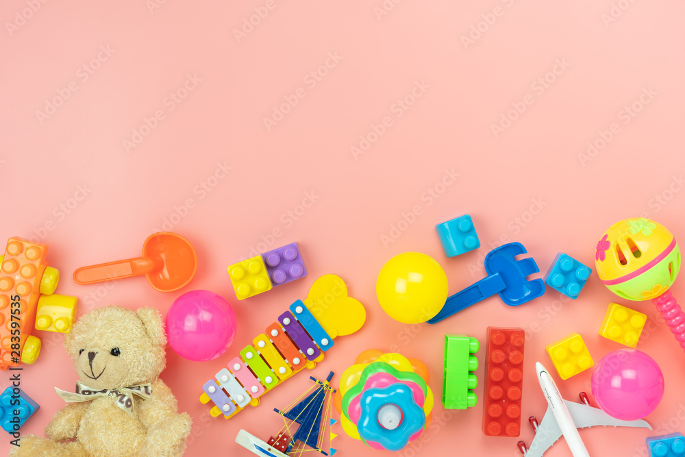 Table top view decoration kid toys for develop background concept.Flat lay accessories baby to play with items child on modern pink paper at office desk.Copy space for add text.pastel tone wallpaper. Table top view decoration kid toys for develop background concept.Flat lay accessories baby to play with items child on modern pink paper at office desk.Copy space for add text.pastel tone wallpaper.