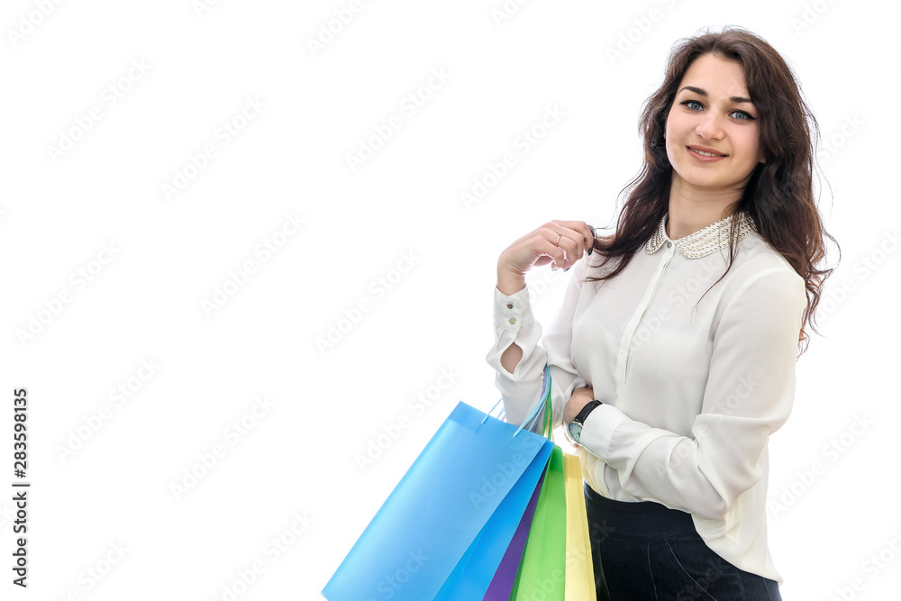 Woman holding shopping bags isolated on white Woman holding shopping bags isolated on white