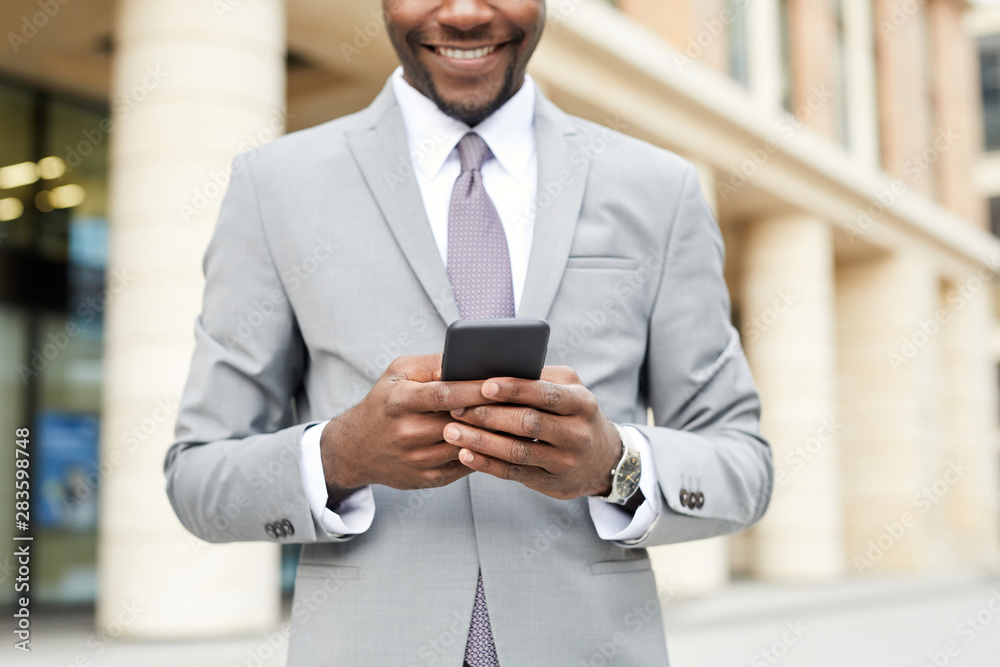 Businessman typing a message Businessman typing a message