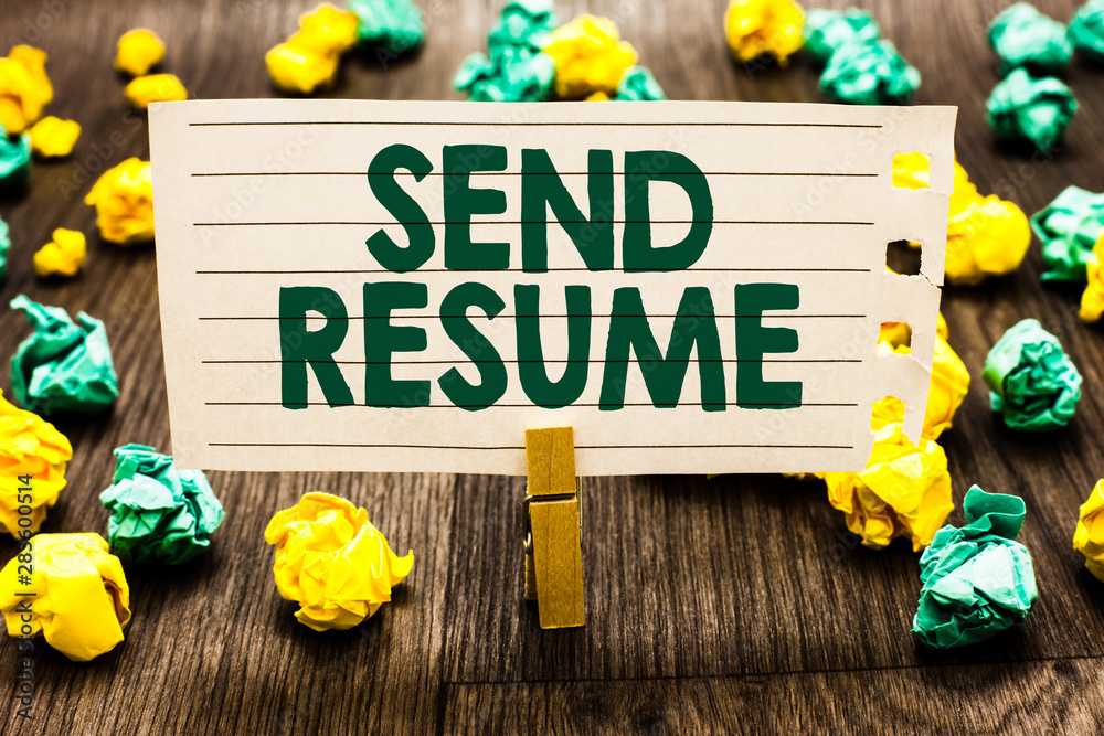 Fototapeta premium Text sign showing Send Resume. Conceptual photo brief account persons education qualifications and occupations Clothespin holding notebook paper crumpled papers several tries mistakes