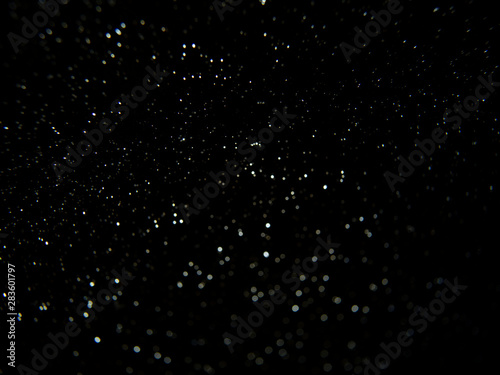 Glitter vintage lights background. Abstract blur background.