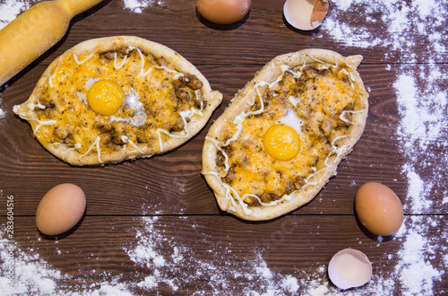 dish top view cooking khachapuri po adzharski photo