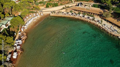 Aerial drone photo of famous paradise celebrity sandy beach of Astir or Asteras in south Athens riviera with turquoise clear waters  Vouliagmeni  Greece