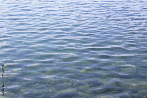 Beautiful transparent lake. Close-up. Background. Texture.