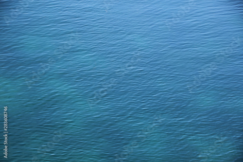 beautiful texture of sea water surface with light ripples, blank for designer, blank for postcard, copy space