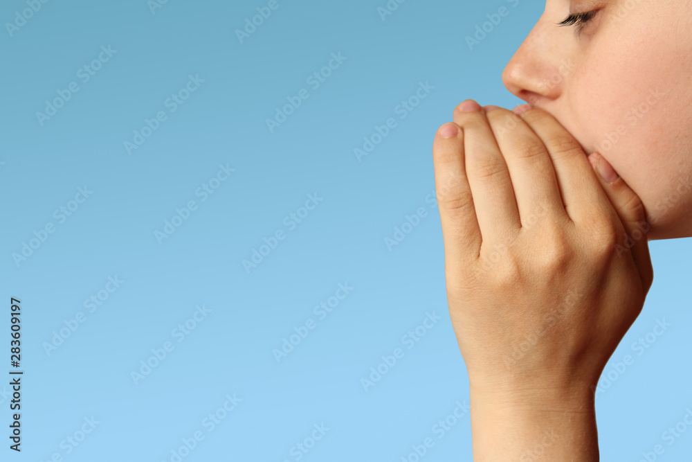 girl, teenager whispers, says something, covering her mouth with a palm, concept of rumors, gossip, secrets, close-up, copy space, isolate girl, teenager whispers, says something, covering her mouth with a palm, concept of rumors, gossip, secrets, close-up, copy space, isolate