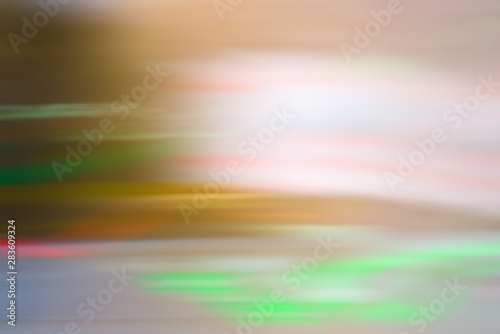 abstract background  light brown with green  blurred motion long exposure
