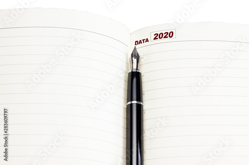 Notebook for planning, pen, inscription 2020 on a white background.