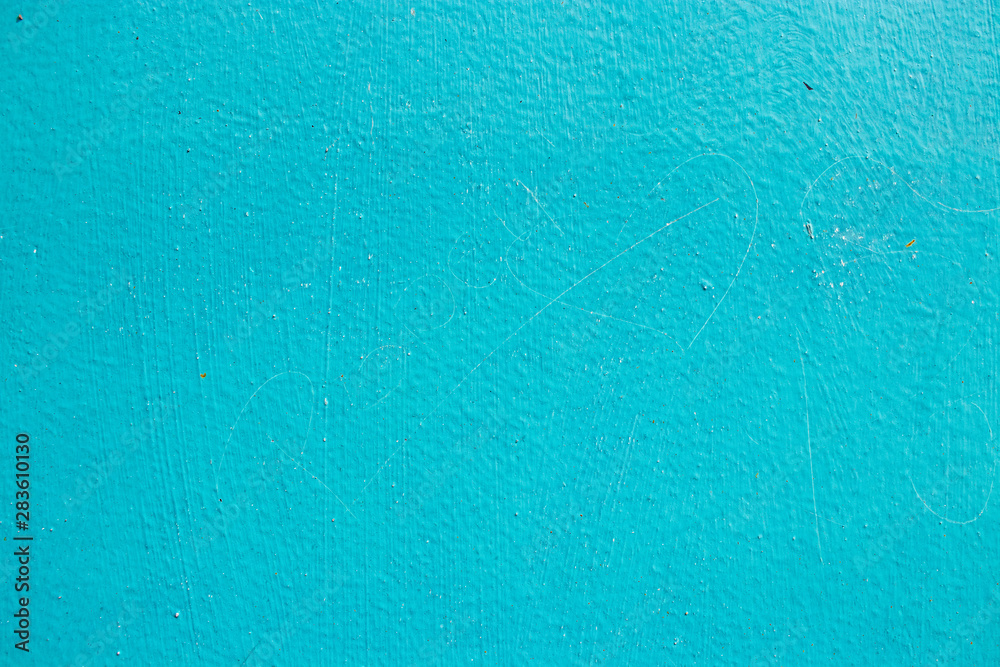 Light blue painted worn wall surface texture Light blue painted worn wall surface texture