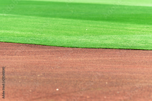 Photography Clean and perfect line between baseball field infield dirt and outfield grass