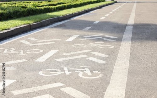 Bicycle lane with marking on asphalt road