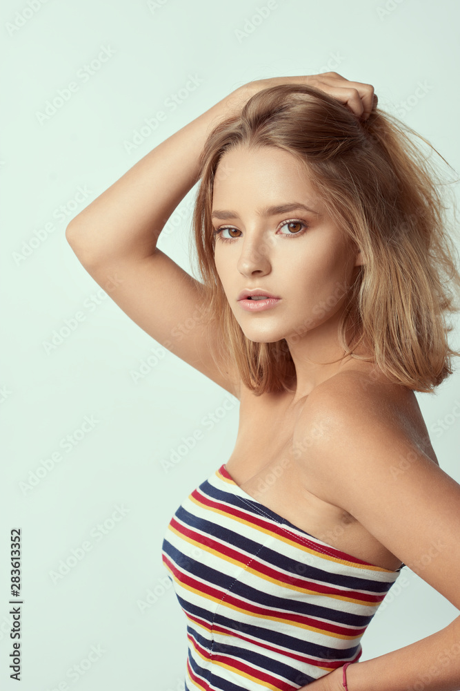 young cute and adorable girl on empty background, blond hair, empty for description, close up studio shot young cute and adorable girl on empty background, blond hair, empty for description, close up studio shot