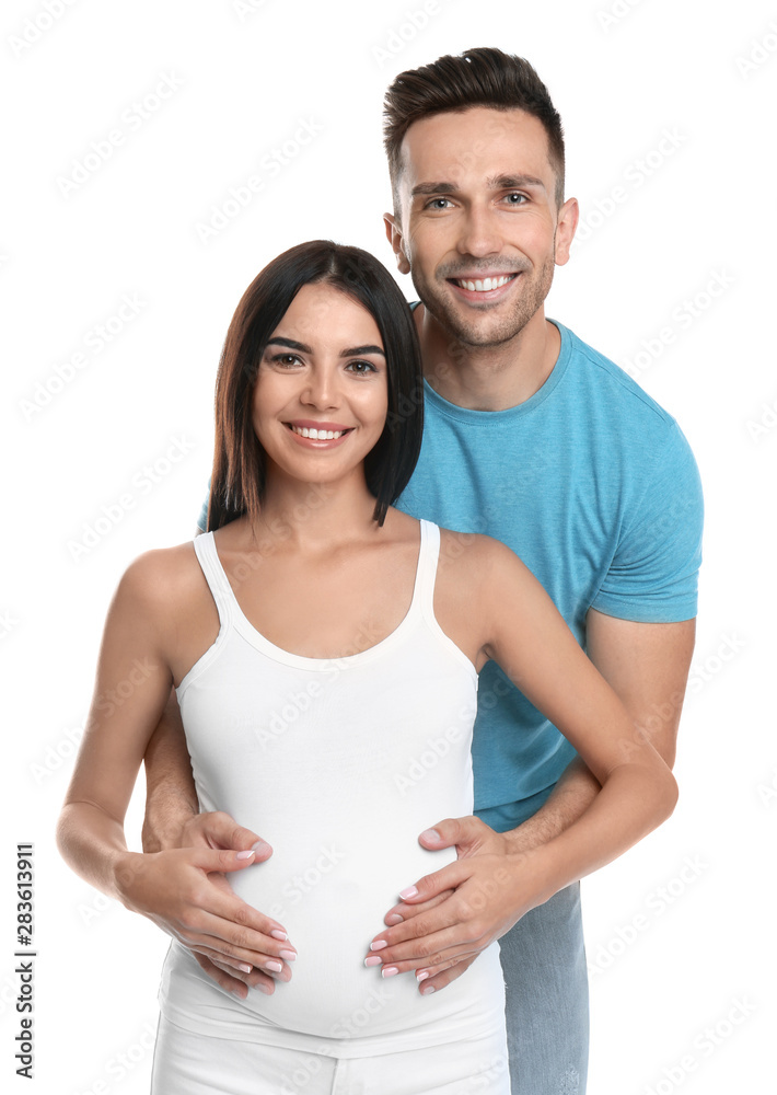 Young happy family holding pregnant belly on white background Young happy family holding pregnant belly on white background