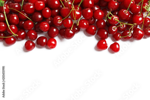 Delicious ripe sweet cherries on white background, top view
