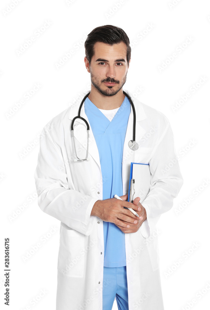 Young male doctor in uniform with stethoscope and clipboard on white background. Medical service Young male doctor in uniform with stethoscope and clipboard on white background. Medical service