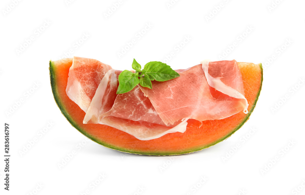 Slice of fresh melon with prosciutto and basil on white background