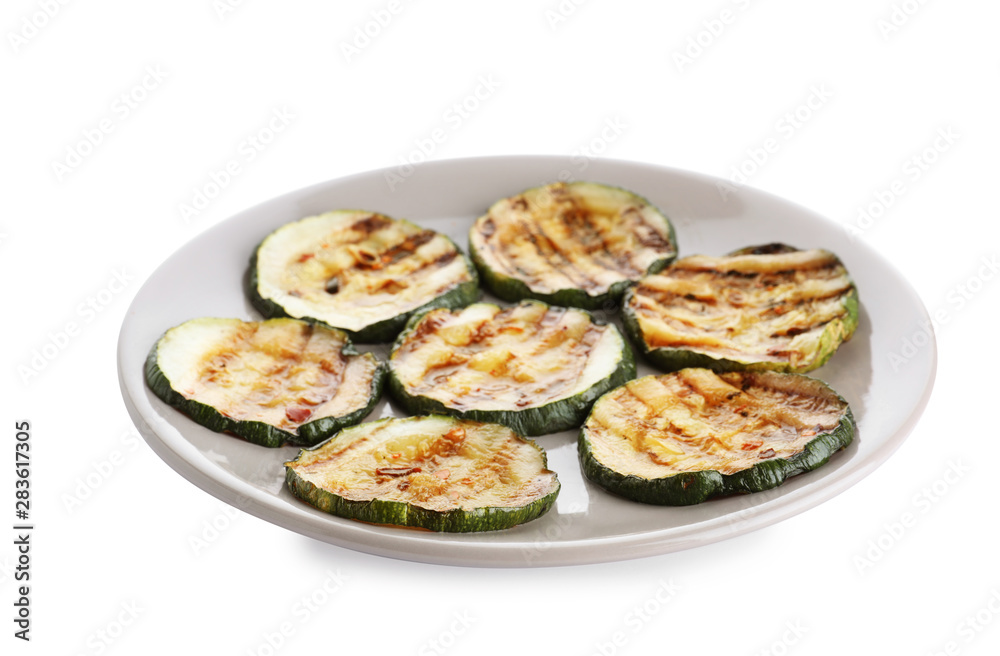 Plate of grilled zucchini slices on white background Plate of grilled zucchini slices on white background