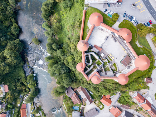 The castle Žužemberk ( Zuzemberk, Seisenburg, Sosenberch) is positioned on the terrace above the Krka River Canyon, Central Slovenia. photo