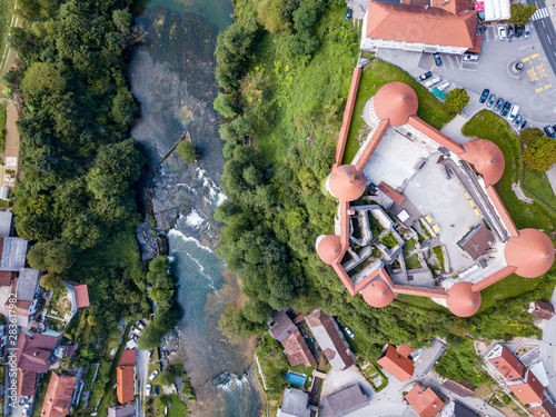 The castle Žužemberk ( Zuzemberk, Seisenburg, Sosenberch) is positioned on the terrace above the Krka River Canyon, Central Slovenia. photo