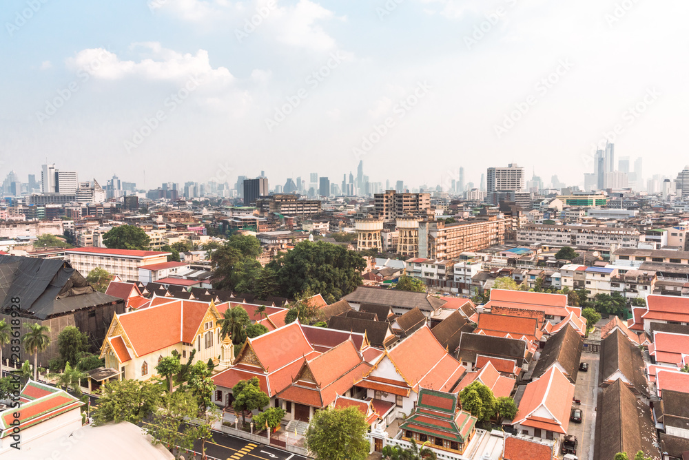 View from the top of the Golden Mount, the Buddhist temple Wat Saket to the financial district Sathon in Bangkok