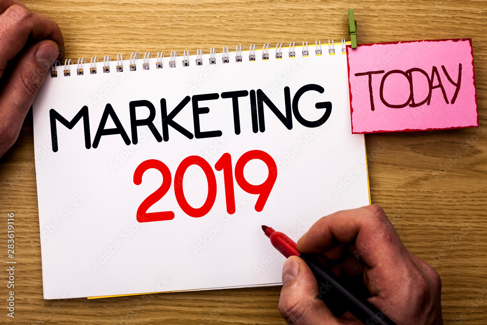 Word writing text Marketing 2019. Business concept for New Year Market Strategies Fresh start Advertising Ideas written by Man Notebook Book Holding Marker the Wooden background Today. Word writing text Marketing 2019. Business concept for New Year Market Strategies Fresh start Advertising Ideas written by Man Notebook Book Holding Marker the Wooden background Today.