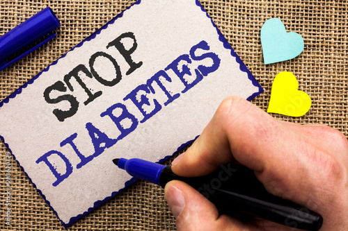 Conceptual hand writing showing Stop Diabetes. Business photo showcasing Take care of your Sugar Levels Healthy Diet Nutrition Habits written Sticky Note the jute bakground with Love Hearts. photo