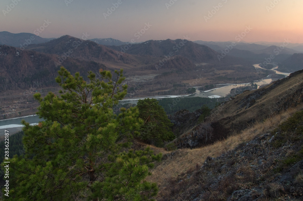 Sunset spring mountain river stream valley