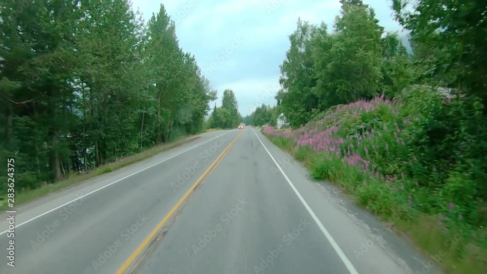 POV through the front windshield while driving through the town of Moose Pass, Alaska on Seward Highway; this section of the Sterling runs through Chugach National Forest and Kenai Mountains POV through the front windshield while driving through the town of Moose Pass, Alaska on Seward Highway; this section of the Sterling runs through Chugach National Forest and Kenai Mountains