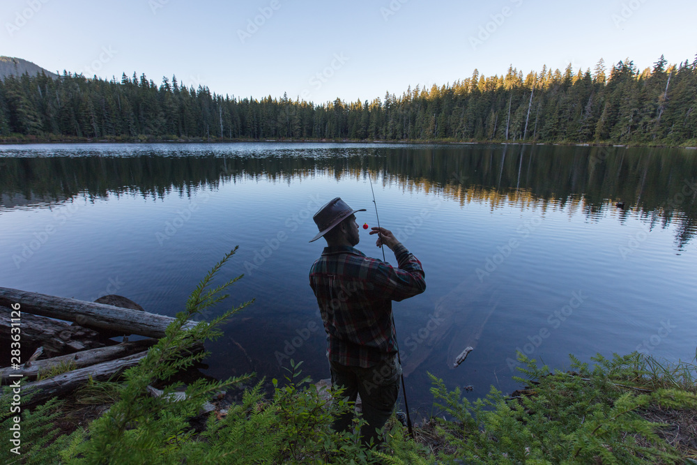 Male fishing in the lake