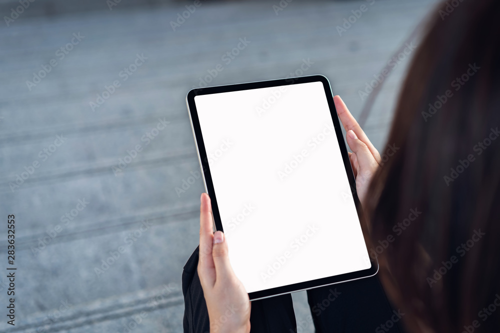 Hand holding digital tablet blank screen. mockup to screen to put products on advertising. Hand holding digital tablet blank screen. mockup to screen to put products on advertising.