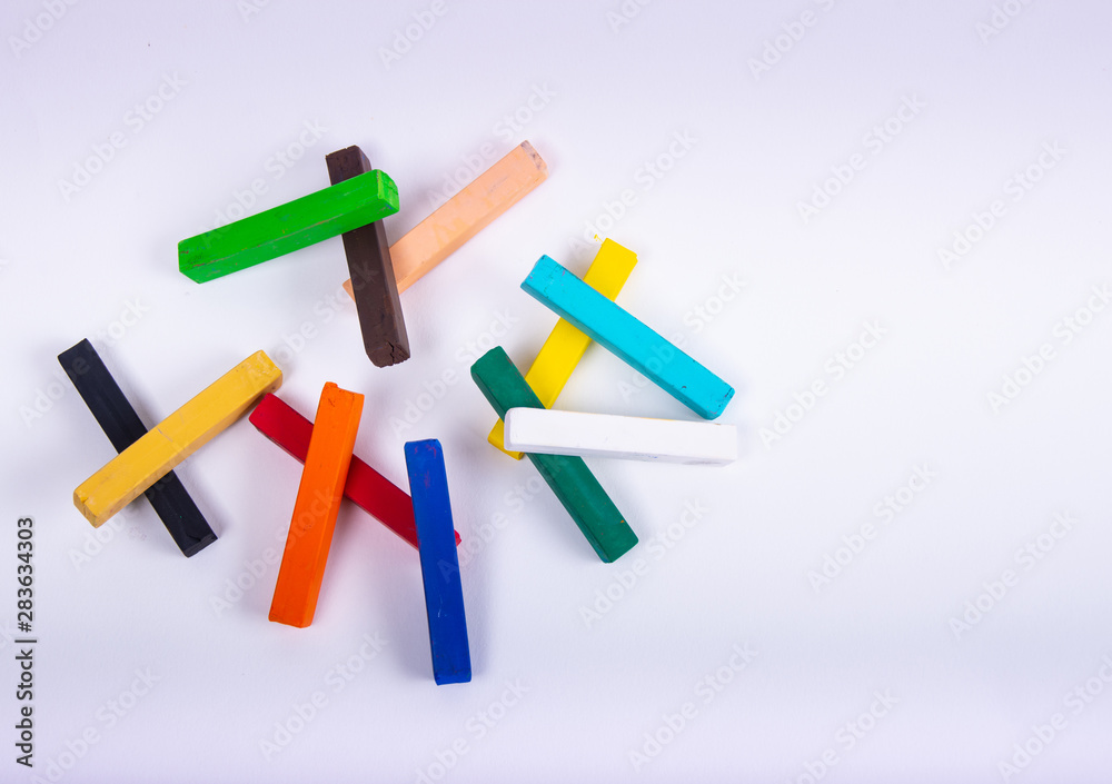 Set of pastel chalks on white background. Back to school. .. Set of pastel chalks on white background. Back to school. ..