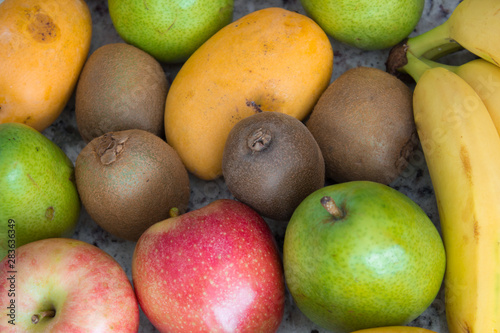Fruits: kiwi, apple, bananas and pears