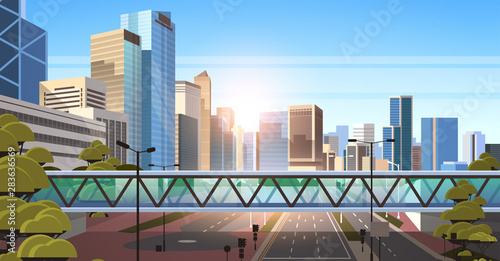 footbridge over highway asphalt road with marking arrows traffic signs city skyline modern skyscrapers cityscape sunshine background flat horizontal