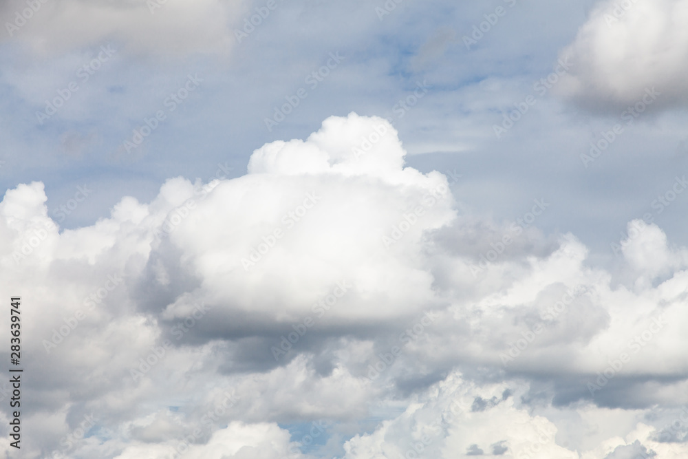 Obraz premium Blue sky background with clouds.