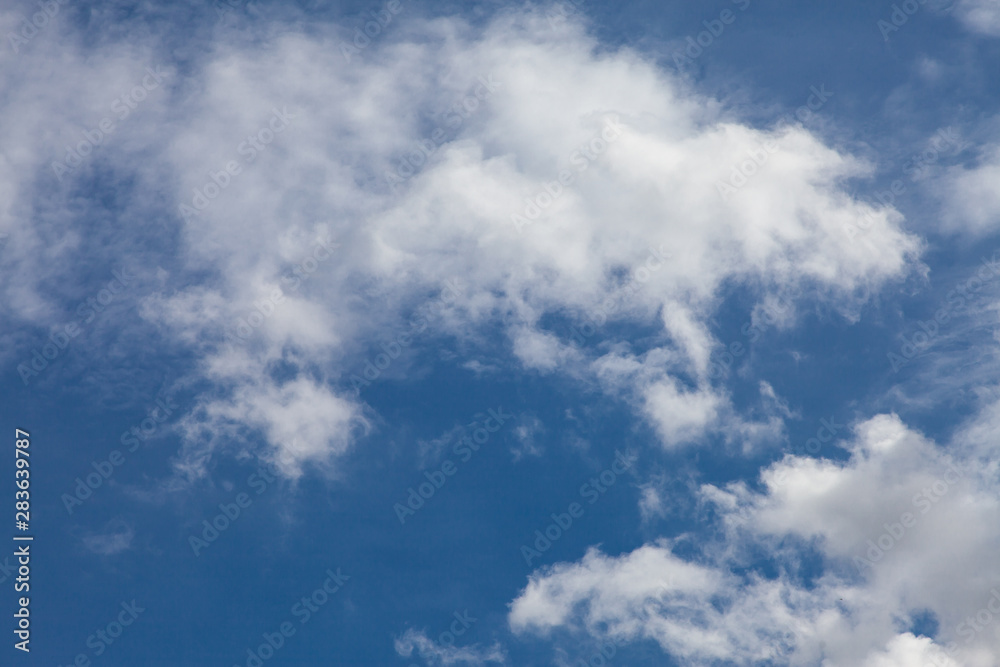 Blue sky background with clouds. Blue sky background with clouds.