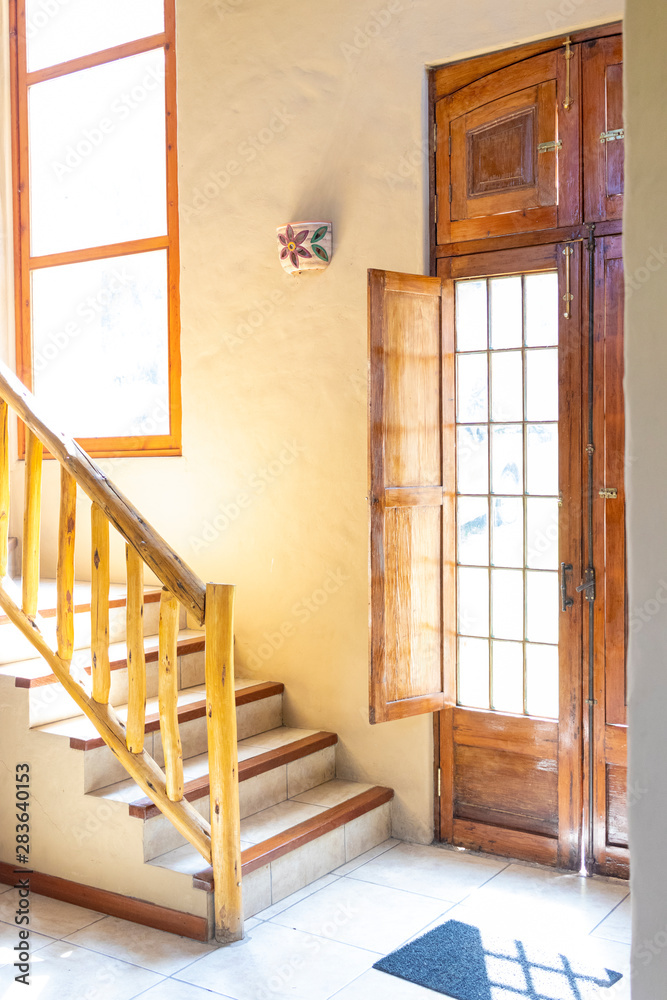 Bright house entrance with stairs Bright house entrance with stairs