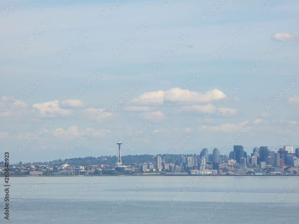 seattle skyline in summer months with cloud cover