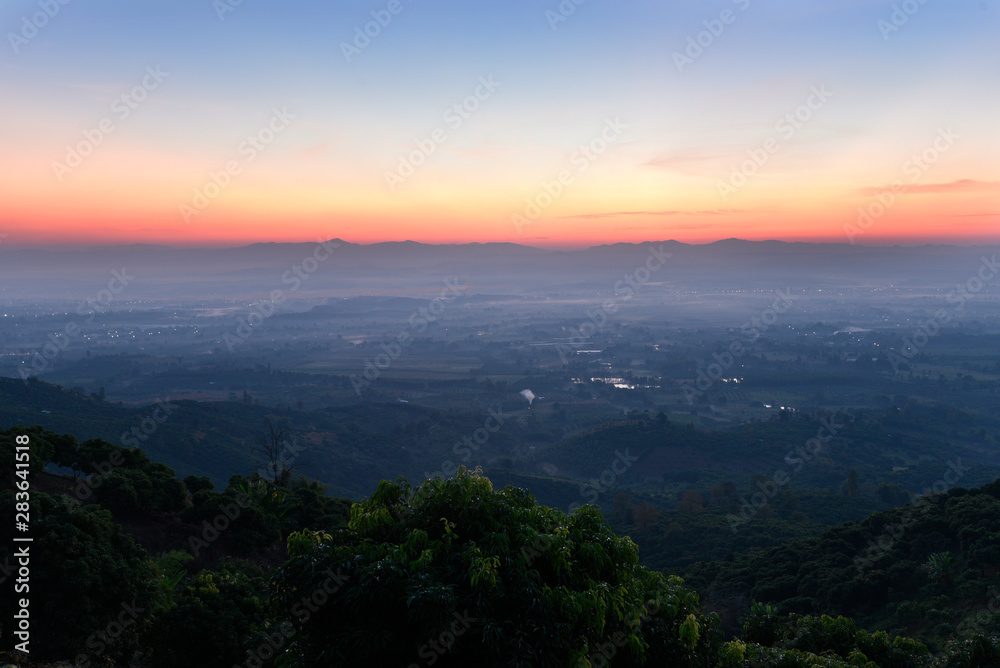 Thin fog layer over a village in a morning Thin fog layer over a village in a morning