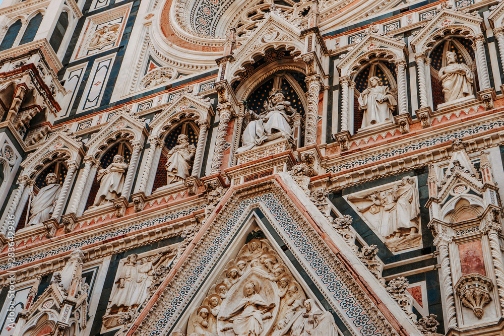 The facade of the Basilica of Saint Mary of the flower in Florence | FLORENCE, ITALY - 14 SEPTEMBER 2018. The facade of the Basilica of Saint Mary of the flower in Florence | FLORENCE, ITALY - 14 SEPTEMBER 2018.