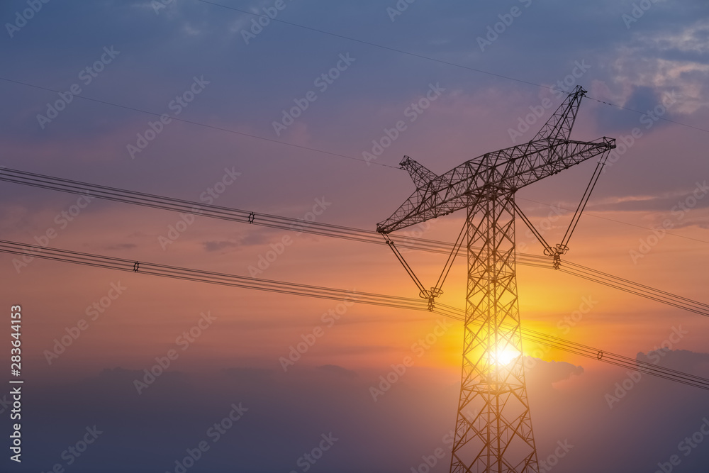 power transmission pylon in sunset