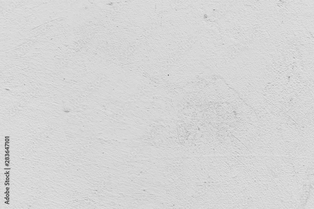 Texture of a concrete wall with cracks and scratches which can be used as a background Texture of a concrete wall with cracks and scratches which can be used as a background