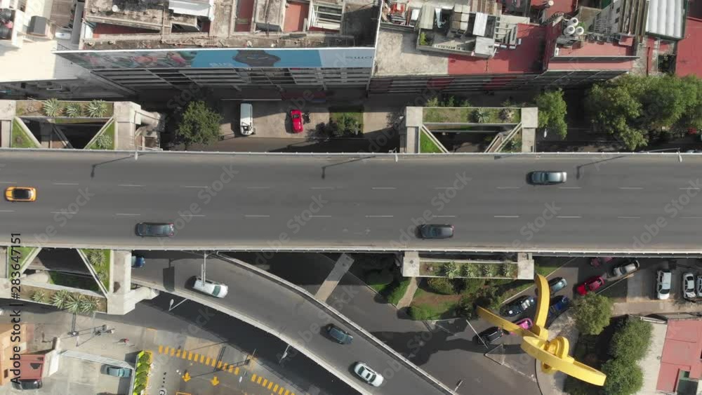 Aerial top down view of a traffic jam on a city highway during rush hour. Drone flying sideways Aerial top down view of a traffic jam on a city highway during rush hour. Drone flying sideways