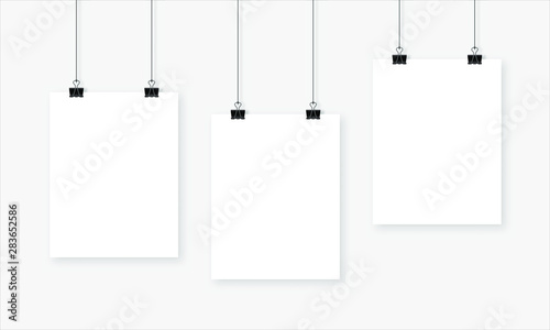 Set of three white realistic blank paper pages with shadow. Page hanging with bulldog clips