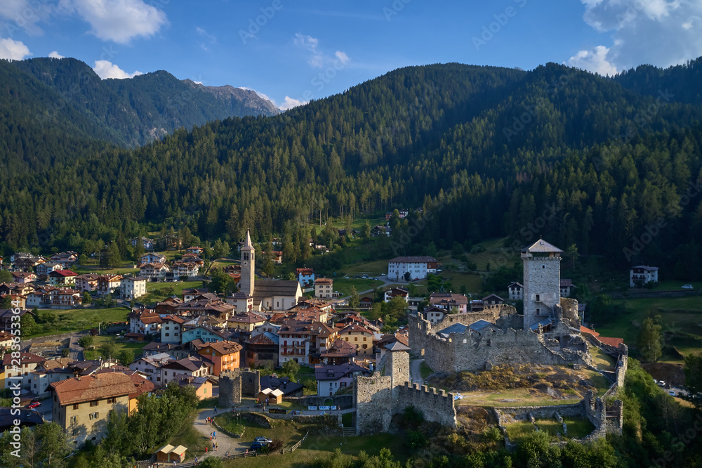 Panoramic view of the Castel San Michele o Castello di Ossana region of Trento northern Italy. Castle ruins surrounded by nature in a quiet location. Aerial view.