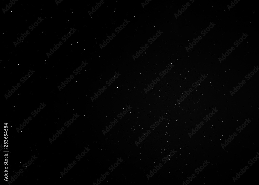 a photograph of the dark night sky full of stars