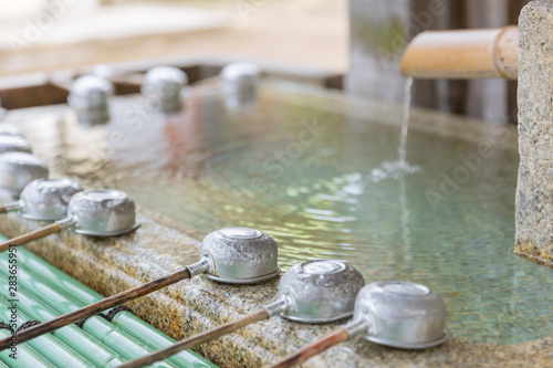 Billede på lærred Holy water for hand cleaning in japan shrine in japan shinto zen culture
